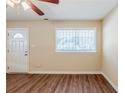 Sun-drenched room showcases durable floors that lead to an entrance at 2720 Santa Barbara Nw Dr, Atlanta, GA 30318