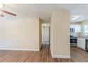 Bright open-concept space featuring durable floors that lead to the kitchen at 2720 Santa Barbara Nw Dr, Atlanta, GA 30318