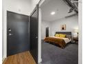 Primary bedroom with plush bedding and modern decor at 260 18Th St # 10320, Atlanta, GA 30363