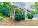 Inviting home exterior with a cozy porch and well-maintained lawn at 804 Thomasville Se Blvd, Atlanta, GA 30315