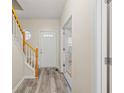 Bright entryway with hardwood floors and staircase at 2637 Cedar Dr, Lawrenceville, GA 30043