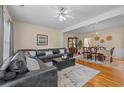 Spacious living room featuring hardwood floors, stylish decor, and ample natural light at 2555 Flat Shoals Rd, Atlanta, GA 30349