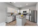 Modern kitchen with stainless steel appliances and island at 3178 Cedar Crest Way, Decatur, GA 30034