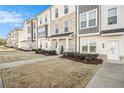 Townhome community featuring multiple units with similar design and landscaping at 110 Cobalt Dr, Fayetteville, GA 30214