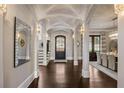 Grand entry with high ceilings, hardwood floors, and elegant lighting at 5220 Green Oak Ct, Atlanta, GA 30327