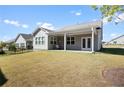 Large backyard with grassy lawn at 427 Bluffs View Ln, Canton, GA 30114