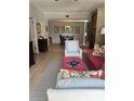 Cozy living room featuring hardwood floors, stylish furniture, and an open floor plan at 195 14Th Ne St # 902, Atlanta, GA 30309