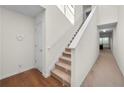 Bright entryway with hardwood floors and staircase at 3654 Woodland Cv, Decatur, GA 30034