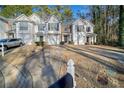 Townhome community with driveway and mailbox at 3654 Woodland Cv, Decatur, GA 30034