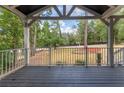 Relaxing covered porch overlooking a wooded backyard at 2711 Glenwood Se Ave, Atlanta, GA 30317