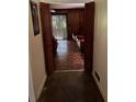 Hallway with wood paneled doors leading to living room at 4315 York Rd, Atlanta, GA 30337