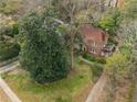 Housetop view of the property showing the house and surrounding gardens at 1080 Clifton Ne Rd, Atlanta, GA 30307