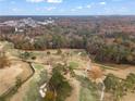 Aerial perspective of a golf course with a neighborhood in the background at 1080 Clifton Ne Rd, Atlanta, GA 30307