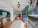 Bright entryway with hardwood floors and blue walls at 2012 Mendenhall Cir, Atlanta, GA 30341