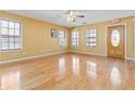 Spacious living room featuring hardwood floors and lots of natural light at 337 N Clayton St, Lawrenceville, GA 30046