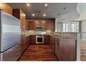 Modern kitchen with stainless steel appliances and wood floors at 20 10Th Nw St # 2104, Atlanta, GA 30309