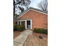 Inviting single-story home with classic brickwork and a tidy front garden at 2591 Stratford Lane, Morrow, GA 30260