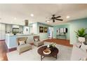 Inviting living room and kitchen with an island, seamlessly connected for modern living at 64 Devon Ln, Avondale Estates, GA 30002