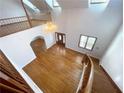 High ceilings and hardwood floors in the living room at 10995 Parsons Rd, Johns Creek, GA 30097