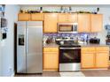 Kitchen with stainless steel appliances and light wood cabinets at 3756 Harvest Dr, Atlanta, GA 30034