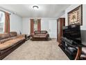 Comfortable living room featuring carpet floors and two sofas at 204 Morris St, Palmetto, GA 30268