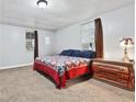 Cozy bedroom offering carpeted floors and ample natural light at 204 Morris St, Palmetto, GA 30268