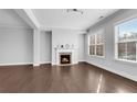 Bright living room features a fireplace, hardwood floors and plenty of natural light at 4139 Torver Ln, Atlanta, GA 30341