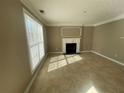 Spacious living room featuring a fireplace and tile flooring at 3116 Leyland Ct, Decatur, GA 30034