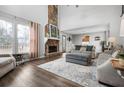 Spacious living room with stone fireplace and high ceilings at 326 Scarlett Ln, Woodstock, GA 30188