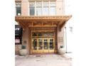 Ornate bronze-detailed building entrance at 32 Peachtree Nw St # 1601, Atlanta, GA 30303