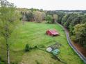 Farmland with barn, chicken coop, and a winding driveway at 1907 Old Loganville Rd, Loganville, GA 30052