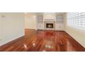 Hardwood floors and fireplace in living room at 647 Shannon Green Cir, Mableton, GA 30126