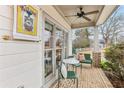 Brick front porch with seating area and ceiling fan at 370 Park Ne Pl, Atlanta, GA 30317