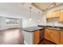 Kitchen featuring dark countertops and wooden cabinets at 2479 Peachtree Ne Rd # 1012, Atlanta, GA 30305