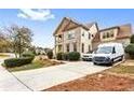 House exterior showing driveway and landscaping at 1114 Ivey Chase Pl, Dacula, GA 30019