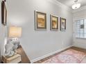 Bright foyer with hardwood floors and a view into the living room at 20 Jacobs Farm Ln # 10, Lawrenceville, GA 30045