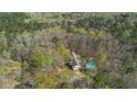 Home situated on a large lot with a pool at 380 Stone Rd, Mcdonough, GA 30253