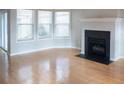 Spacious living room with hardwood floors and fireplace at 5055 Kathryn Glen Dr, Acworth, GA 30101