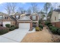 Charming brick townhome with attached garage, landscaped yard, and inviting entrance in a desirable neighborhood at 5800 Oakdale Se Rd # 165, Mableton, GA 30126