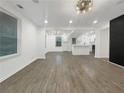 Spacious living room featuring modern vinyl floors and ample natural light at 2704 Ellen Way, Decatur, GA 30032