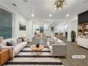 Bright, staged living room featuring modern furniture, a stylish rug, and an open layout at 2704 Ellen Way, Decatur, GA 30032