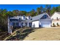Newly built home with gray siding and stone accents at 40 Eryn Ter, Covington, GA 30014
