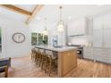 Spacious kitchen with island, stainless steel appliances, and hardwood floors at 1211 Stephens Se St, Smyrna, GA 30080