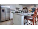 Modern kitchen with stainless steel appliances and granite countertops at 537 Daffodil Ln, Mcdonough, GA 30253