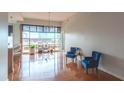 Bright living room with hardwood floors, big windows, and an open floor plan at 250 Park Avenue West Nw # 903, Atlanta, GA 30313