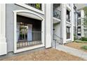 Private balcony with sliding glass doors and iron railings at 2657 Lenox Ne Rd # 134-2, Atlanta, GA 30324