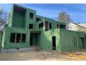 Two-story modern home construction featuring Zip System sheathing and exposed framing at 3534 Rockhaven Ne Cir, Atlanta, GA 30324