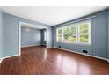 Hardwood floors and neutral walls in the living room at 241 W Simon Nw Ter, Atlanta, GA 30318