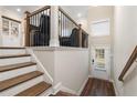 Two-story entryway with hardwood floors, staircase, and loft area at 2641 Blackburn Ct, Smyrna, GA 30080