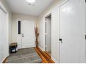 Neat entryway with hardwood floors and storage at 7037 Shangrila Trl, Riverdale, GA 30296